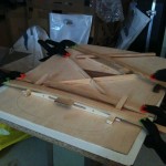 Gluing the sound bars and braces to the guitar top (3)